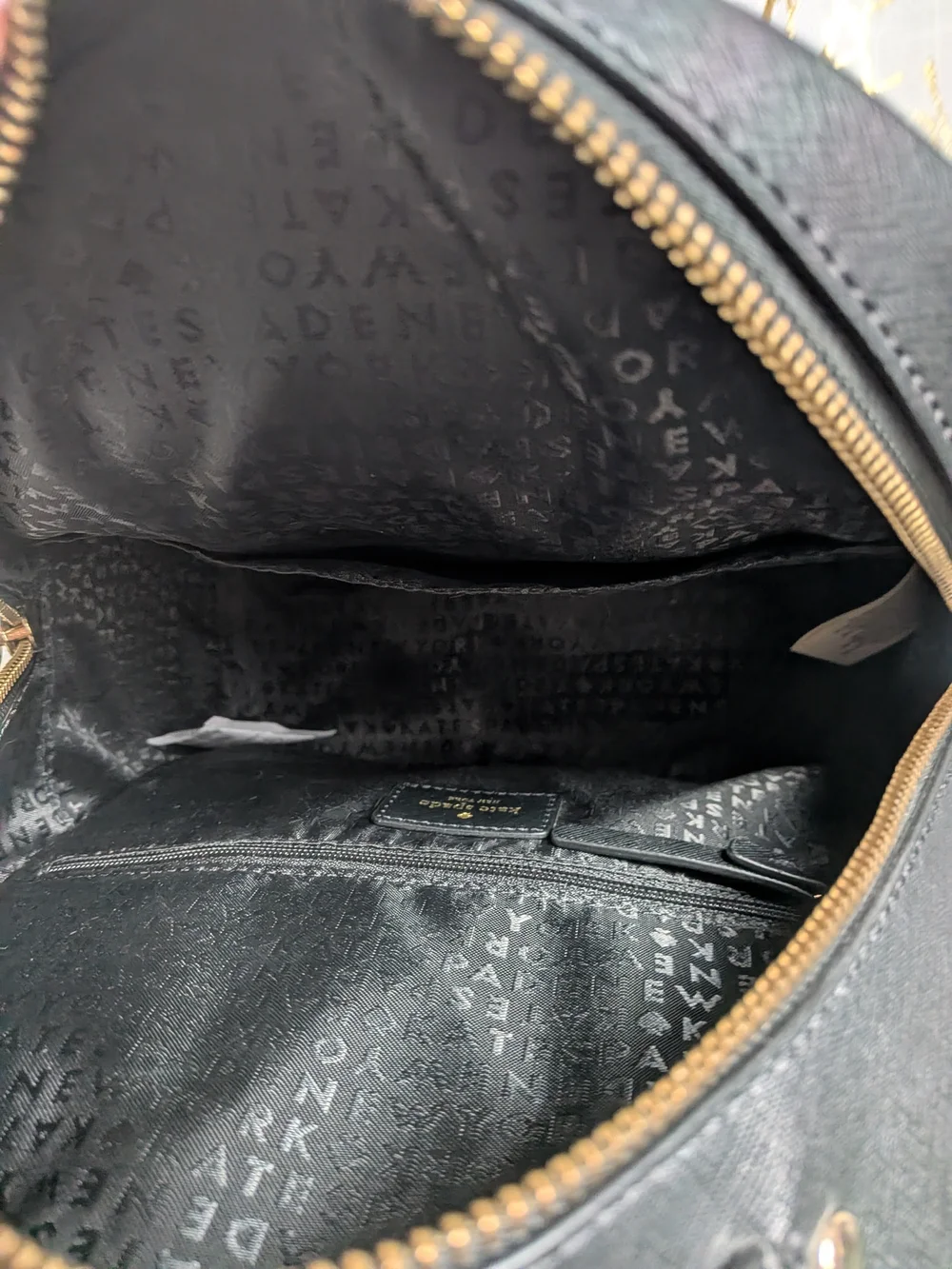 kate spade Black Bunny Ear Mini Backpack with Pom